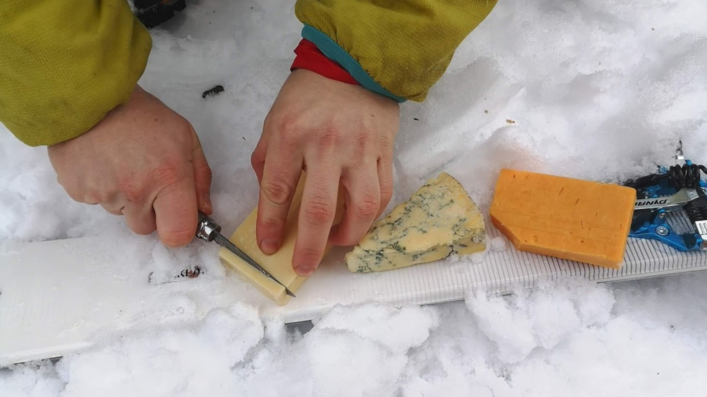 Cutting cheese on a ski