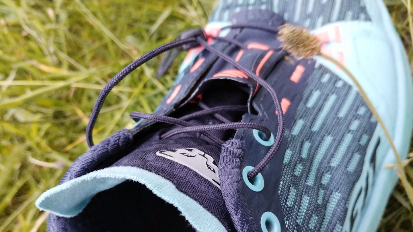 The laces and upper of the Dynafit Ultra 2 trail running shoes