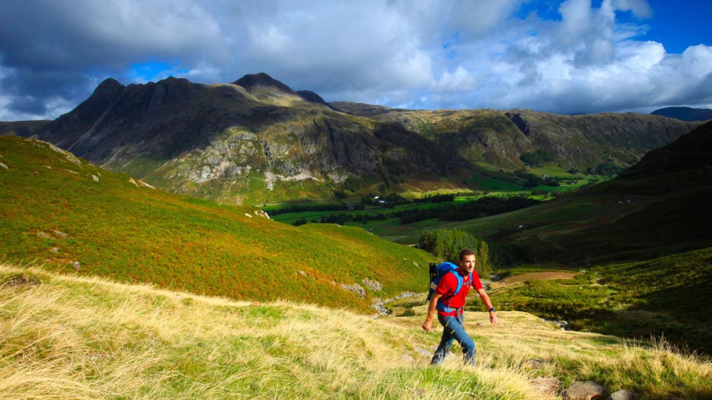 Walking in the Lake District with the Langdale Pikes behind