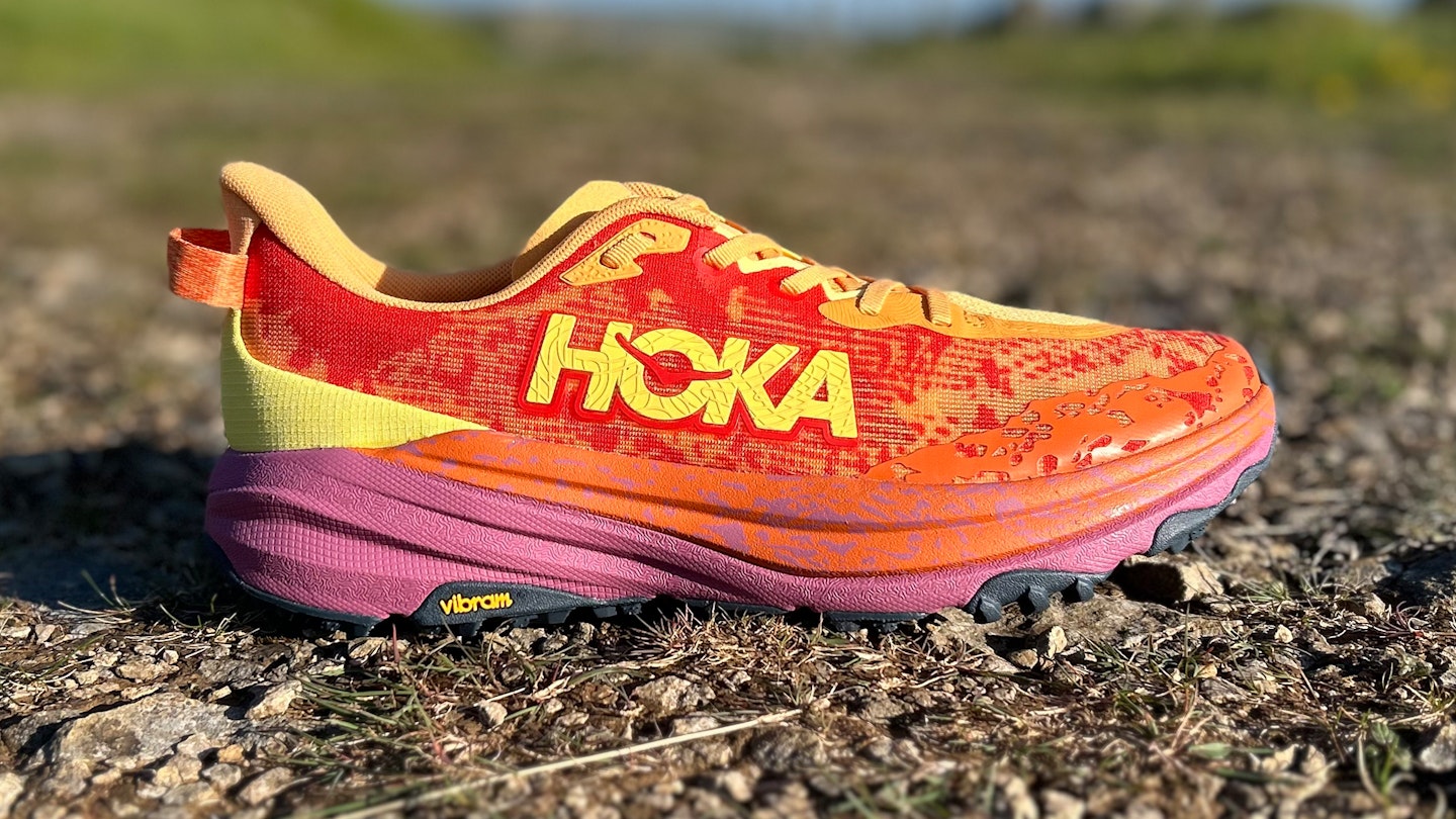 Hoka speedgoat 6 trail running shoe on gravel