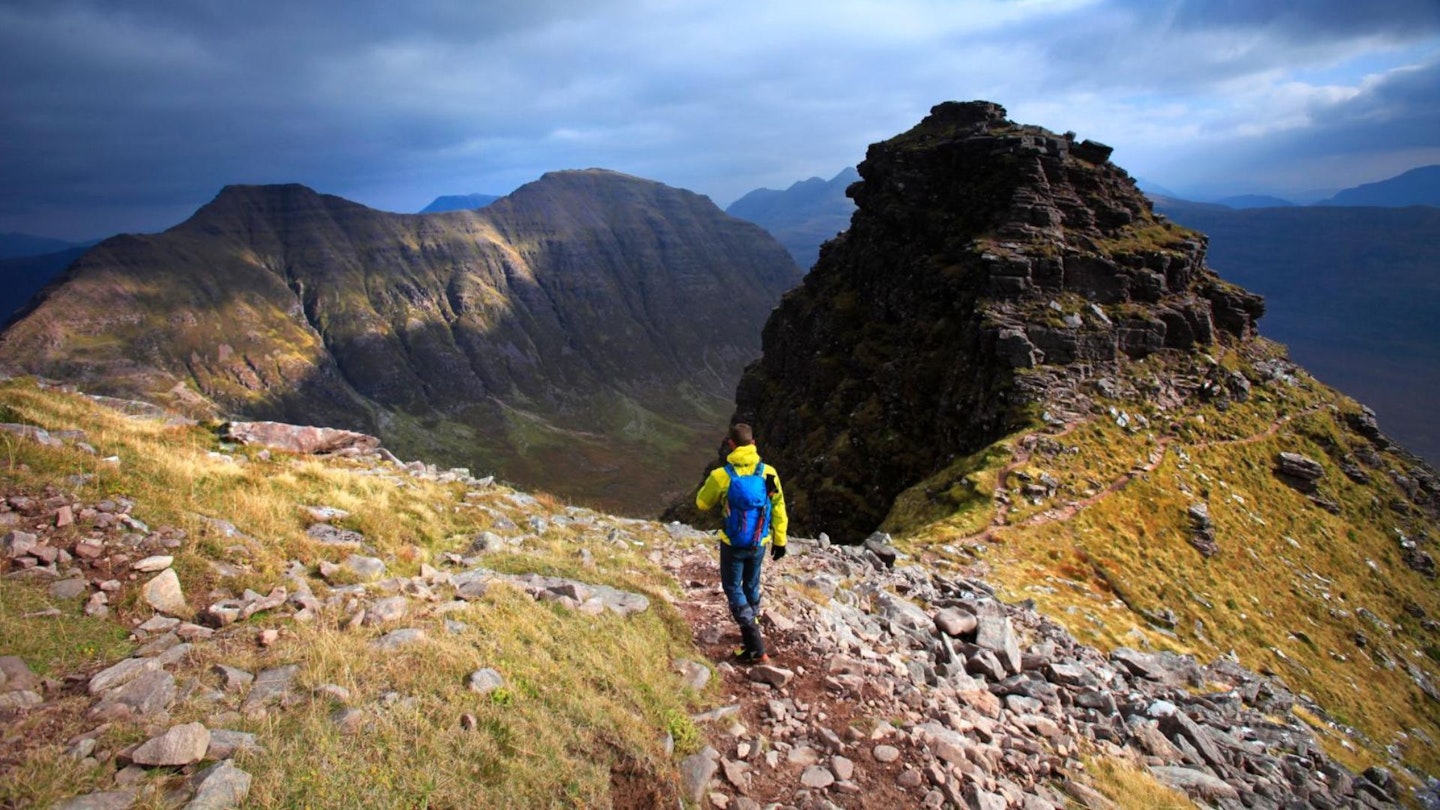 Walking towards one of the Horns of Alligin Torridon Beinn Alligin