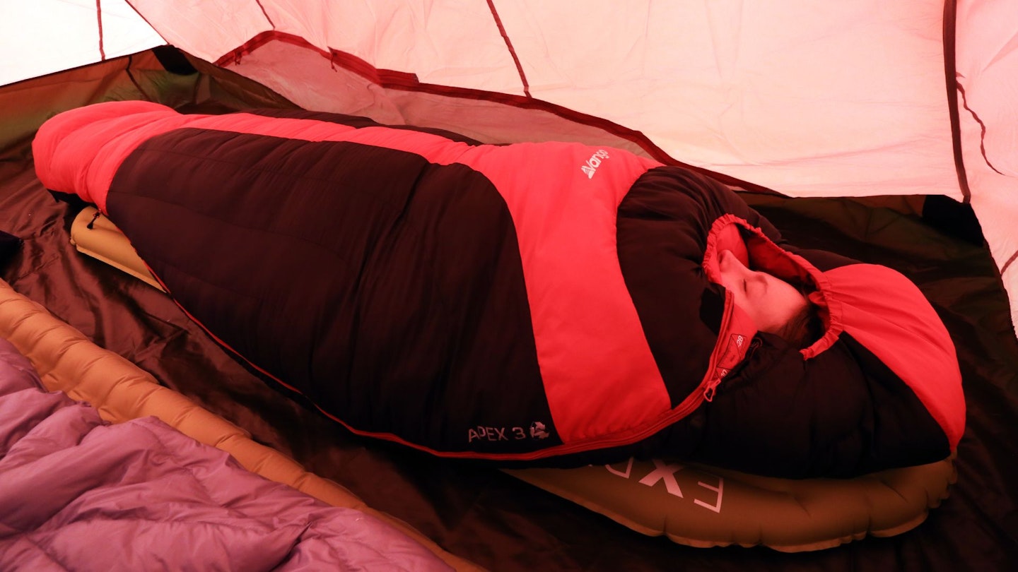 Person sleeping Vango Apex 3