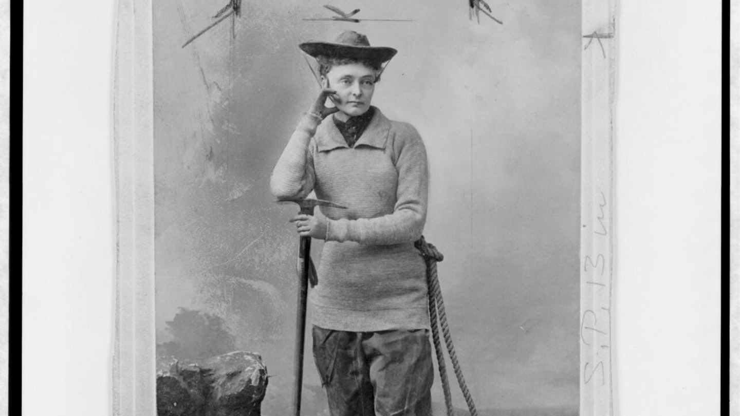 Early woollen mountaineering kit with long ice axe