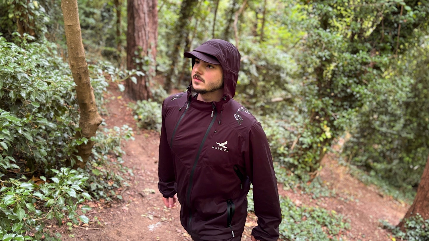 Harrier Exmoor waterproof trail running jacket being tested in the woods