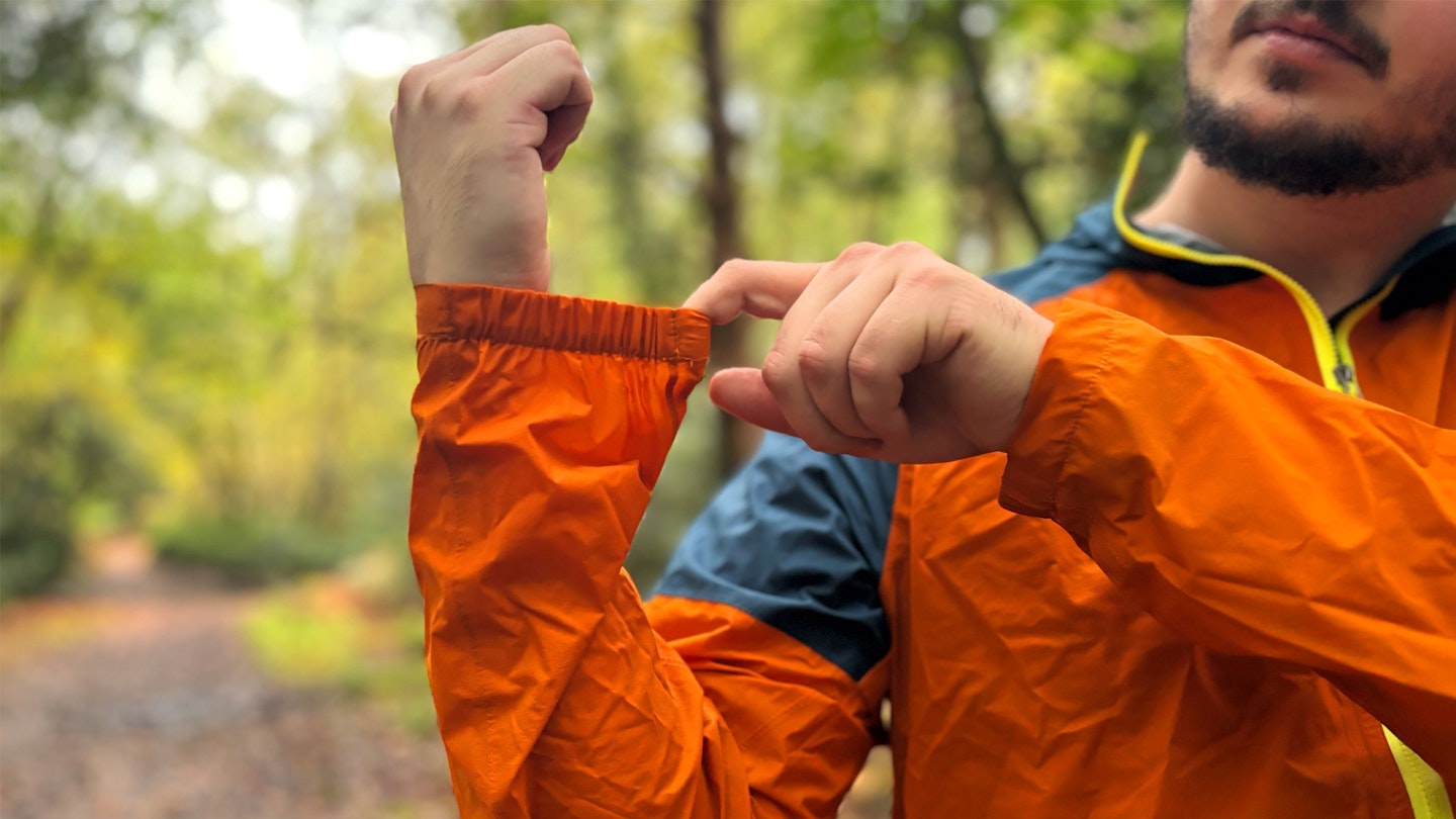 La Sportiva Pocketshell waterproof running jacket being tested in the woods 3