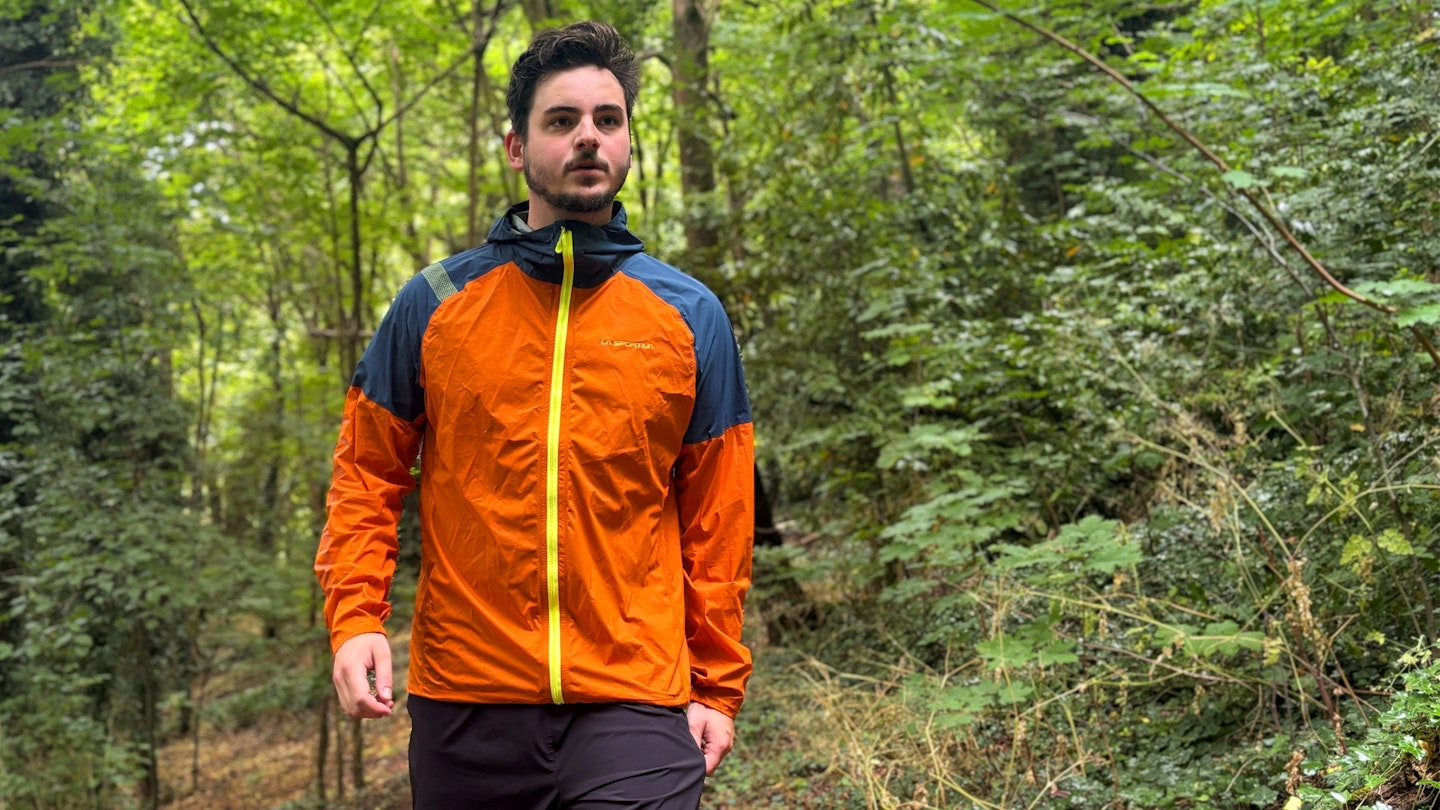 La Sportiva Pocketshell waterproof running jacket being tested in the woods