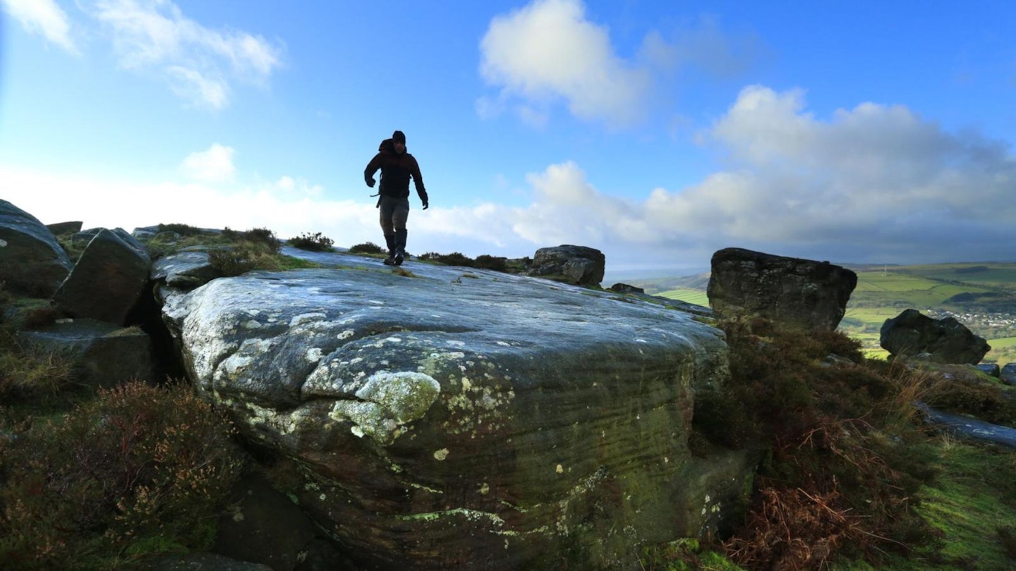 Walking on gritstone at Baslow Edge in the Peak District