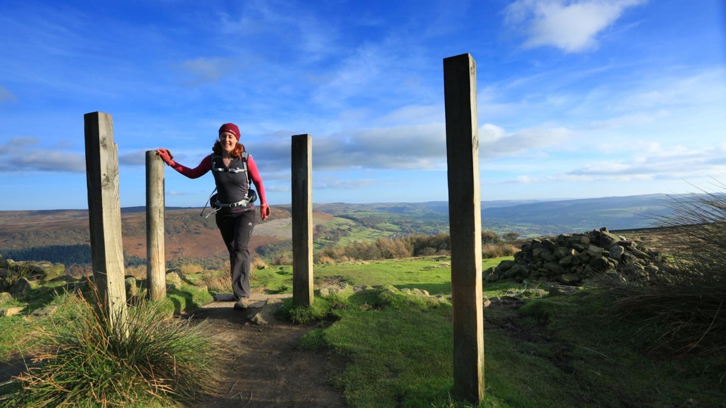 Female Hiker heading for the top of Win Hill Peak District