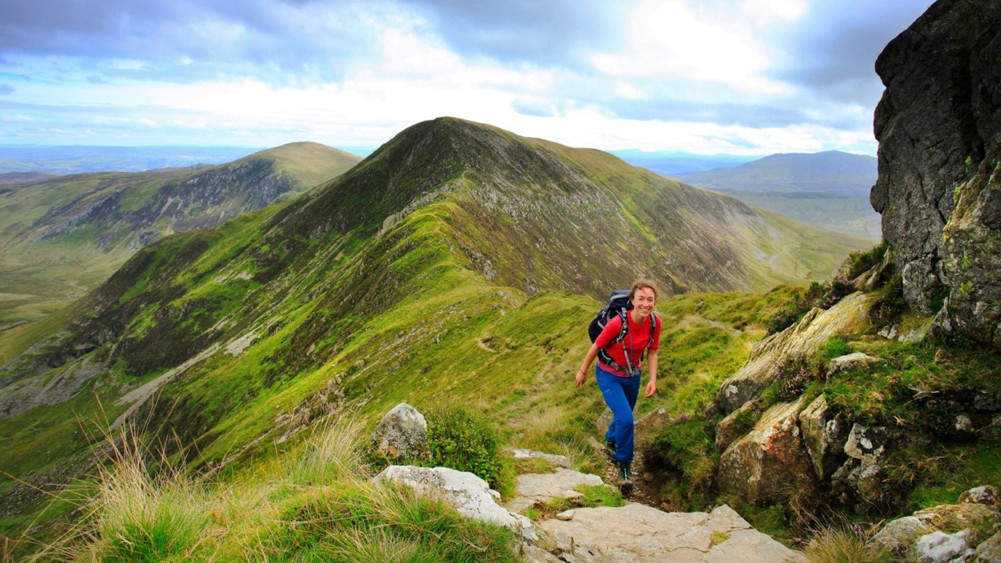 Woman wearing walking trousers on a ridgeline