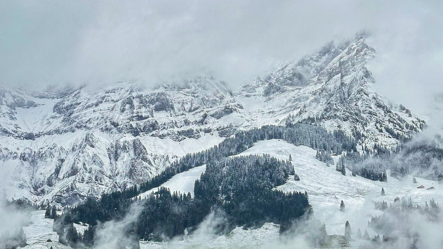 Grey frosty clouds in the mountains