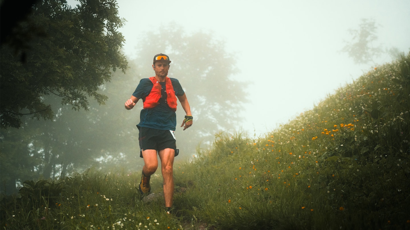 Simon James trail running in the rain