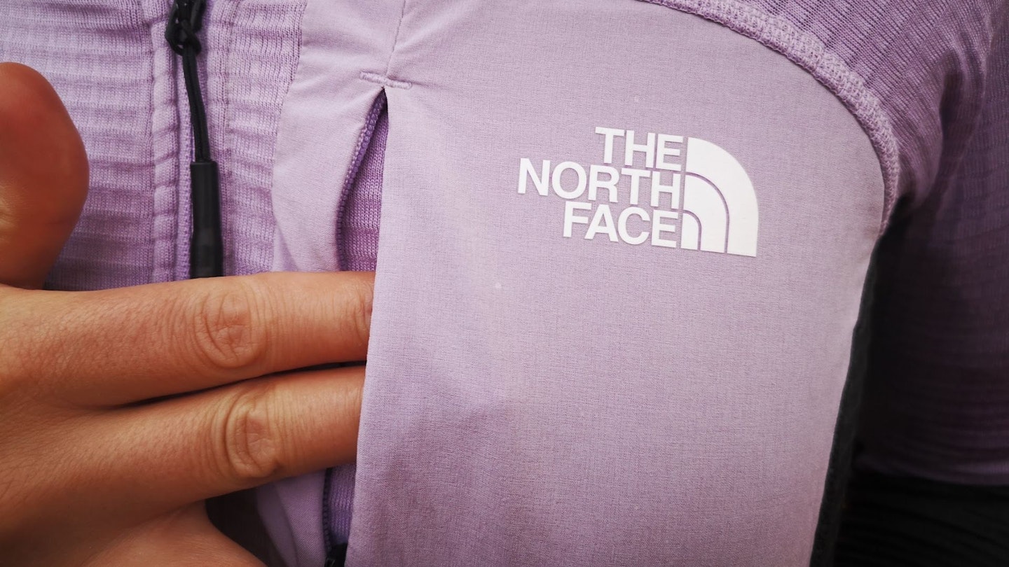 TNF Stormgap Power Grid Jacket logo