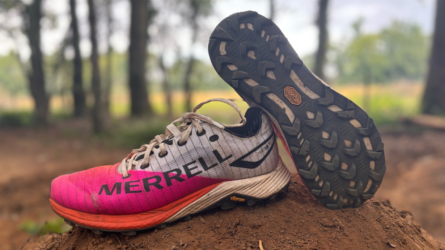 Merrell MTL Longsky 2 trail running shoes on a muddy hill