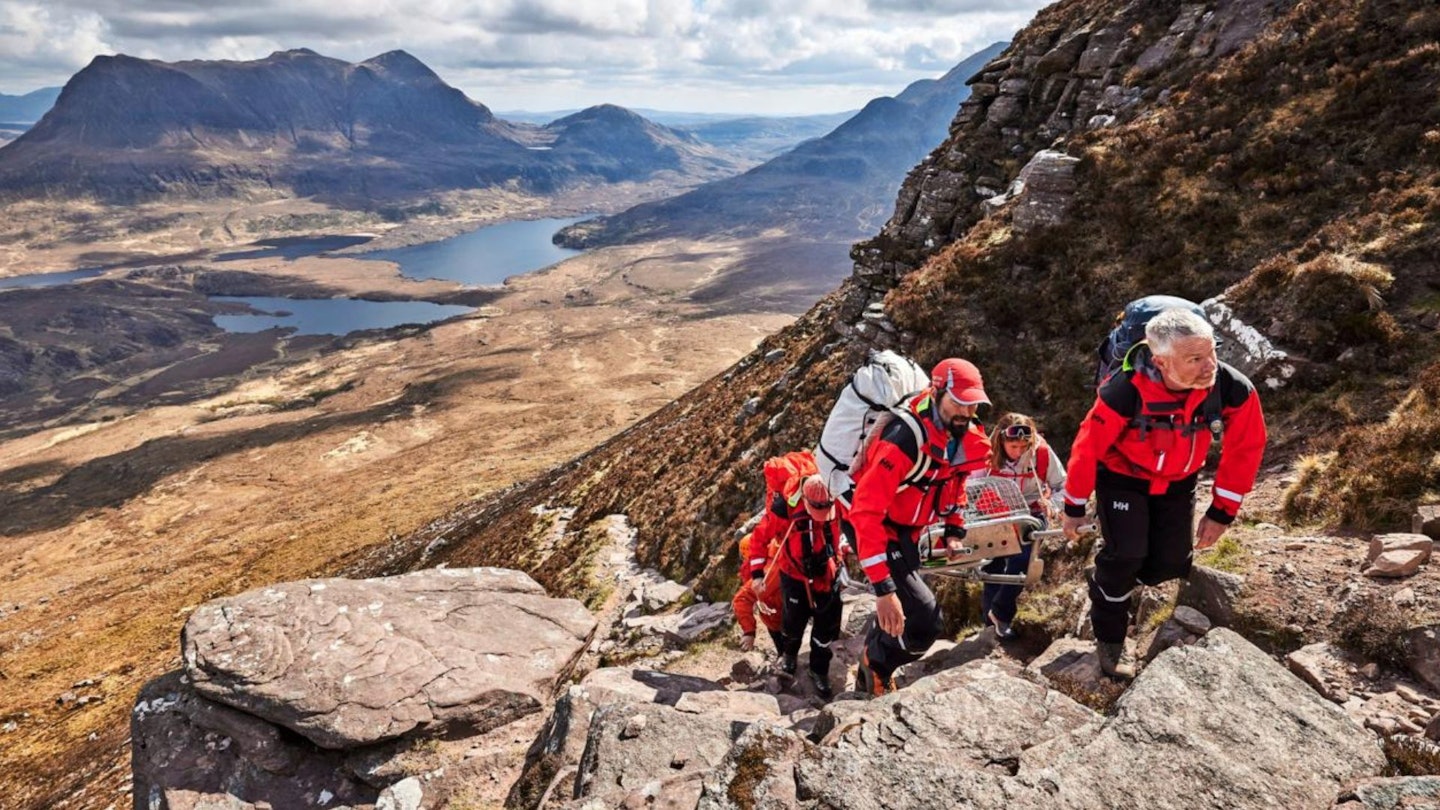 Mountain Rescue team climbing mountain