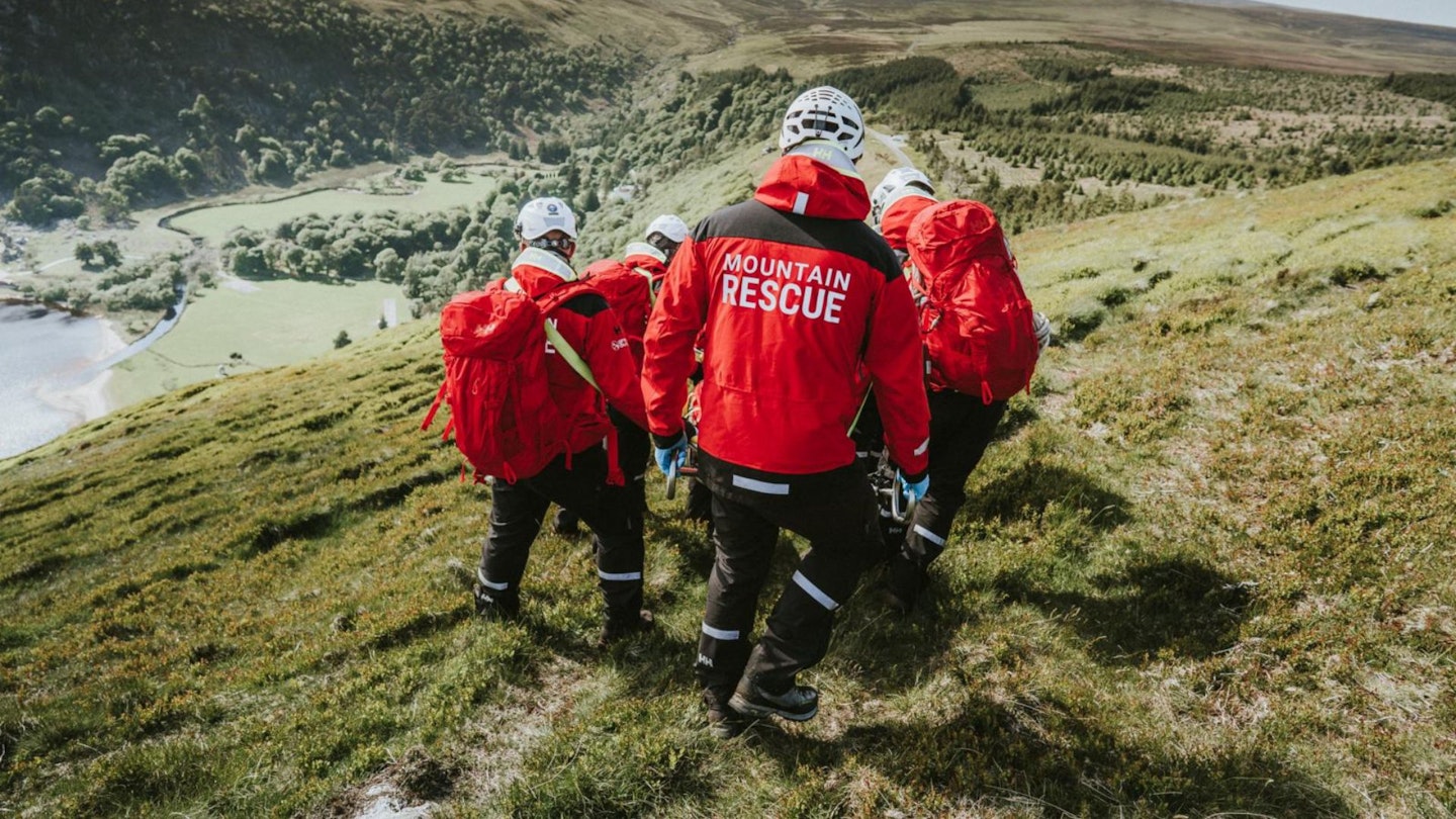 Mountain Rescue team descending a hill