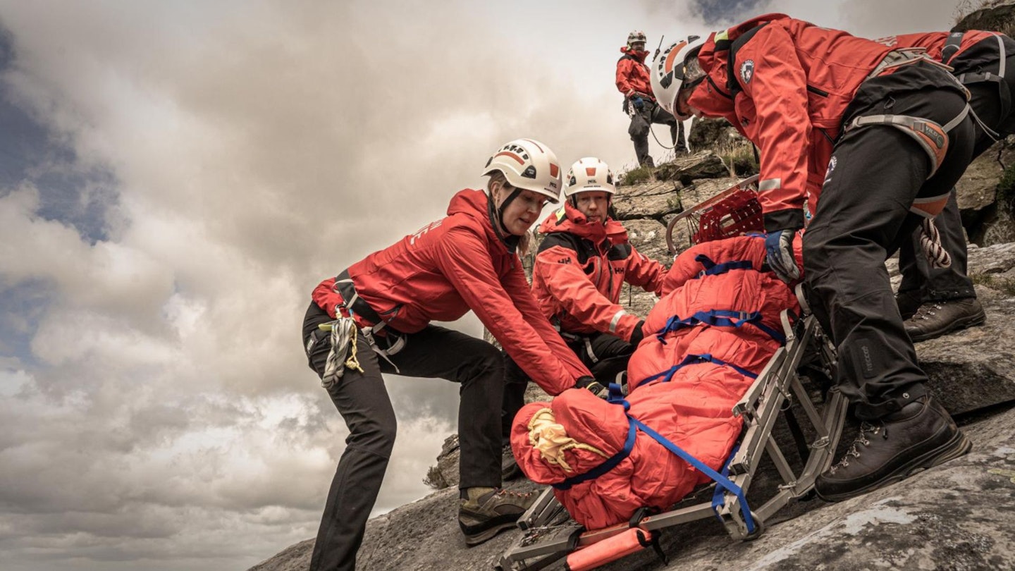 Mountain Rescue team lowering a stretcher