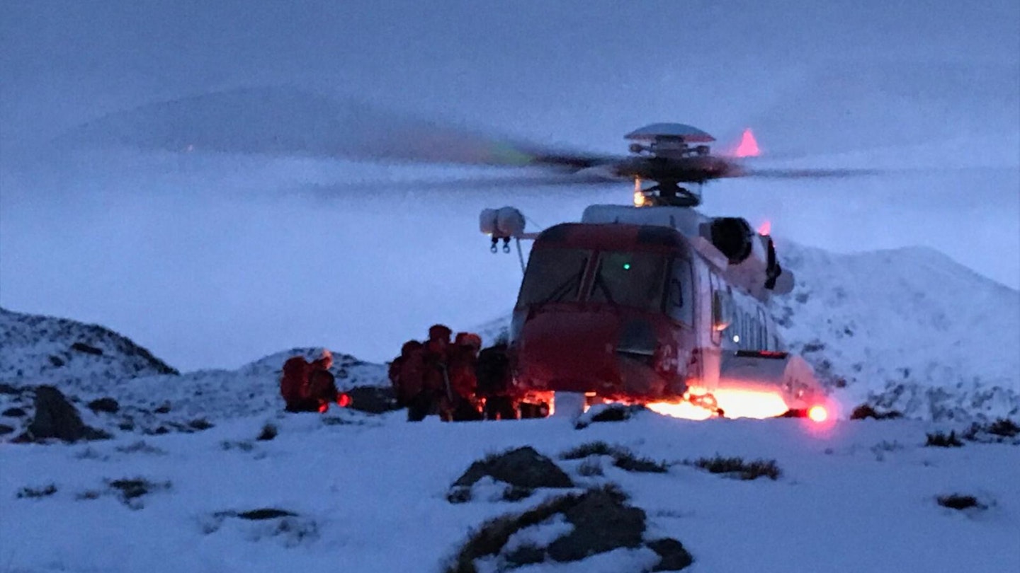 Mountain Rescue team with helicopter