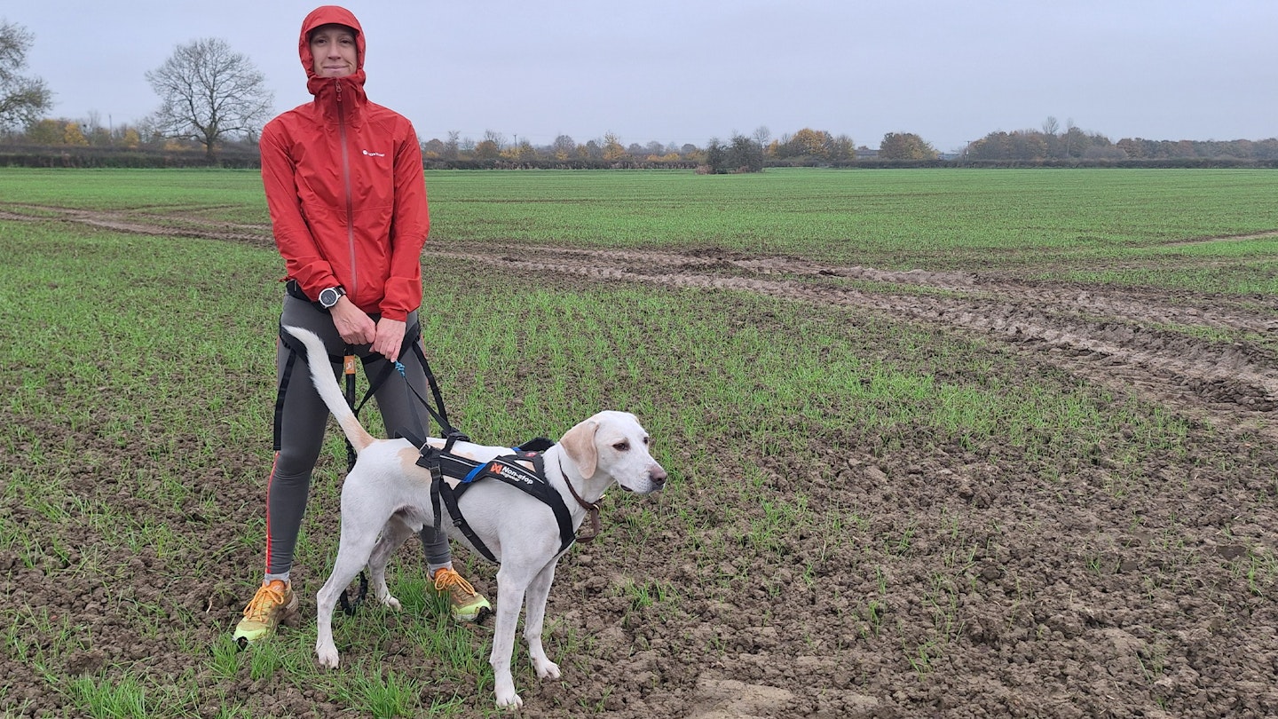 Tester Lily Canter and her dog wearing the Montane Minimus womens waterproof running jacket