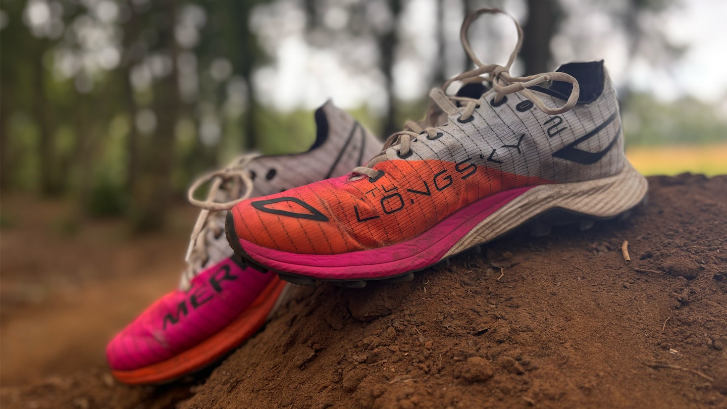 side on shot of the merrell MTL Longsky 2 trail running shoes in the woods