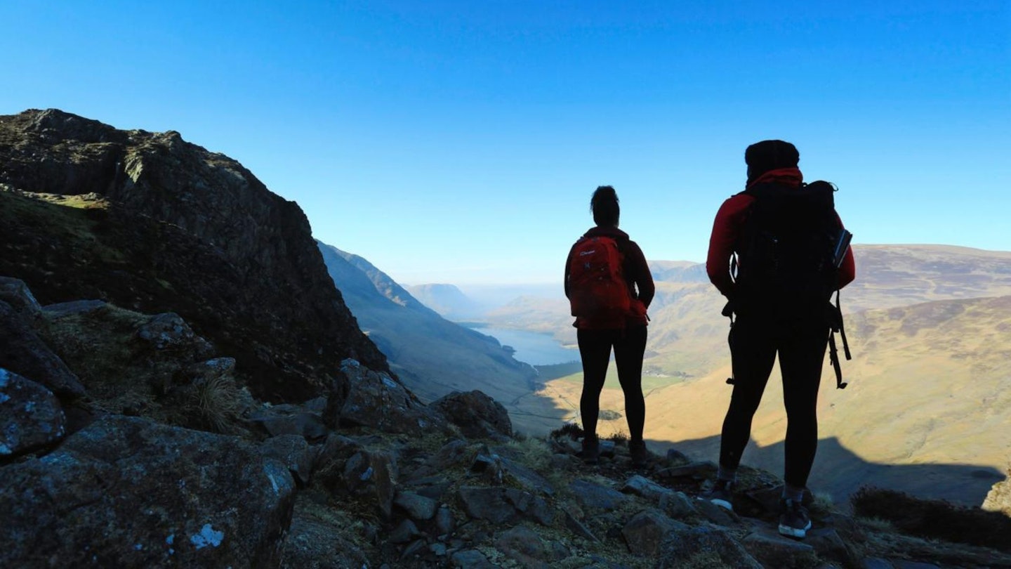 Hikers heading for Haystacks above Buttermere Lake District