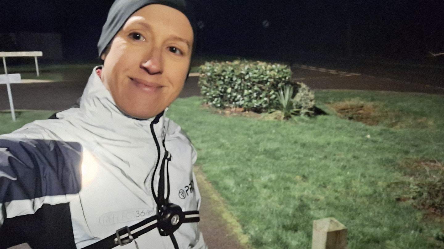 LFTO expert gear tester Lily Canter wearing the Provis Reflect360 waterproof running jacket