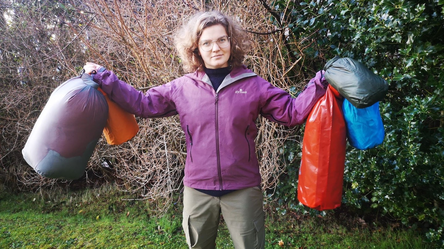 Gear tester Fliss holds some of the best dry bags