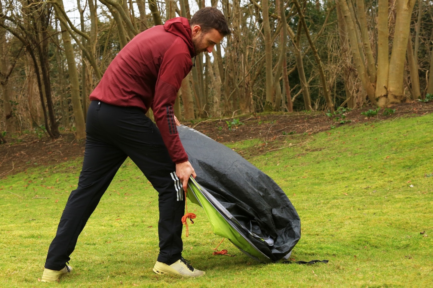 Folding a pop-up tent