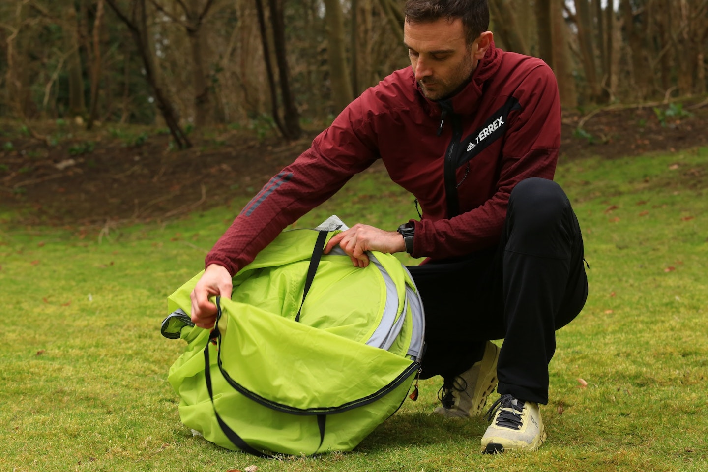 Putting a pop-up tent into its bag