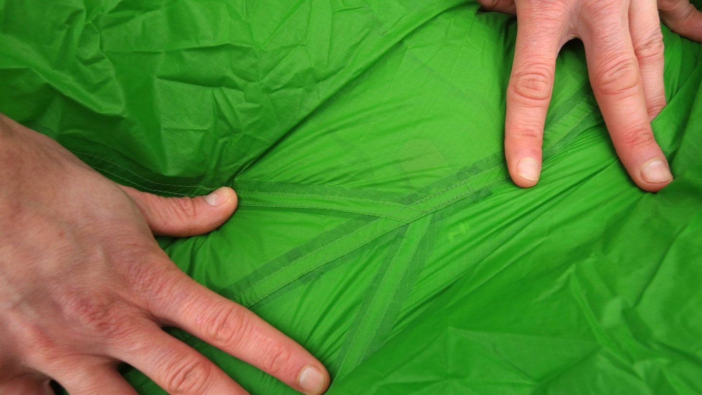 The seams on a tent fabric