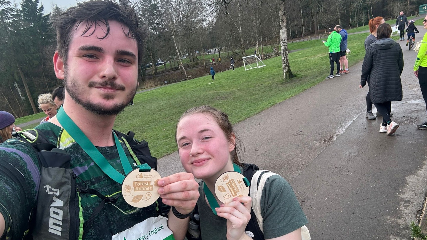 two runners milo wilson chloe price selfie at forestry england run