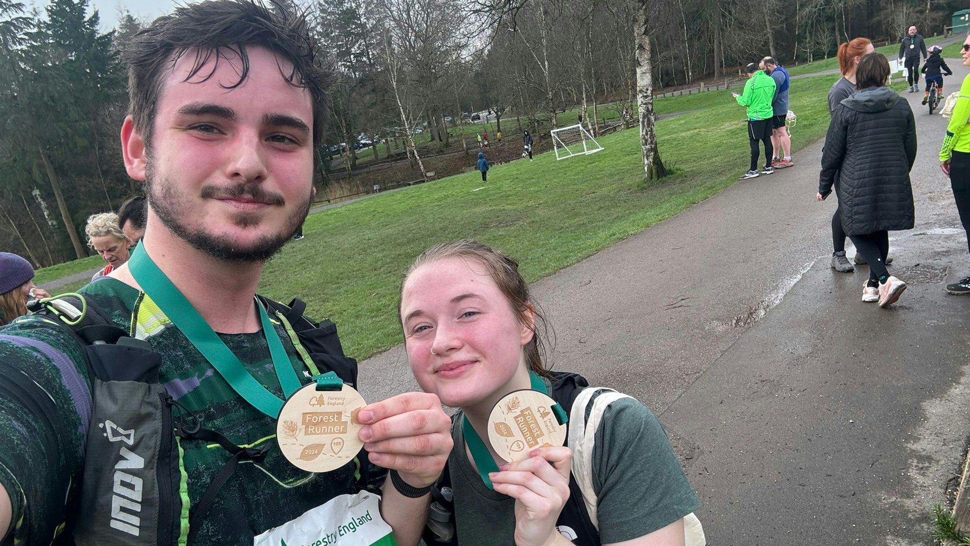 two runners milo wilson chloe price selfie at forestry england run