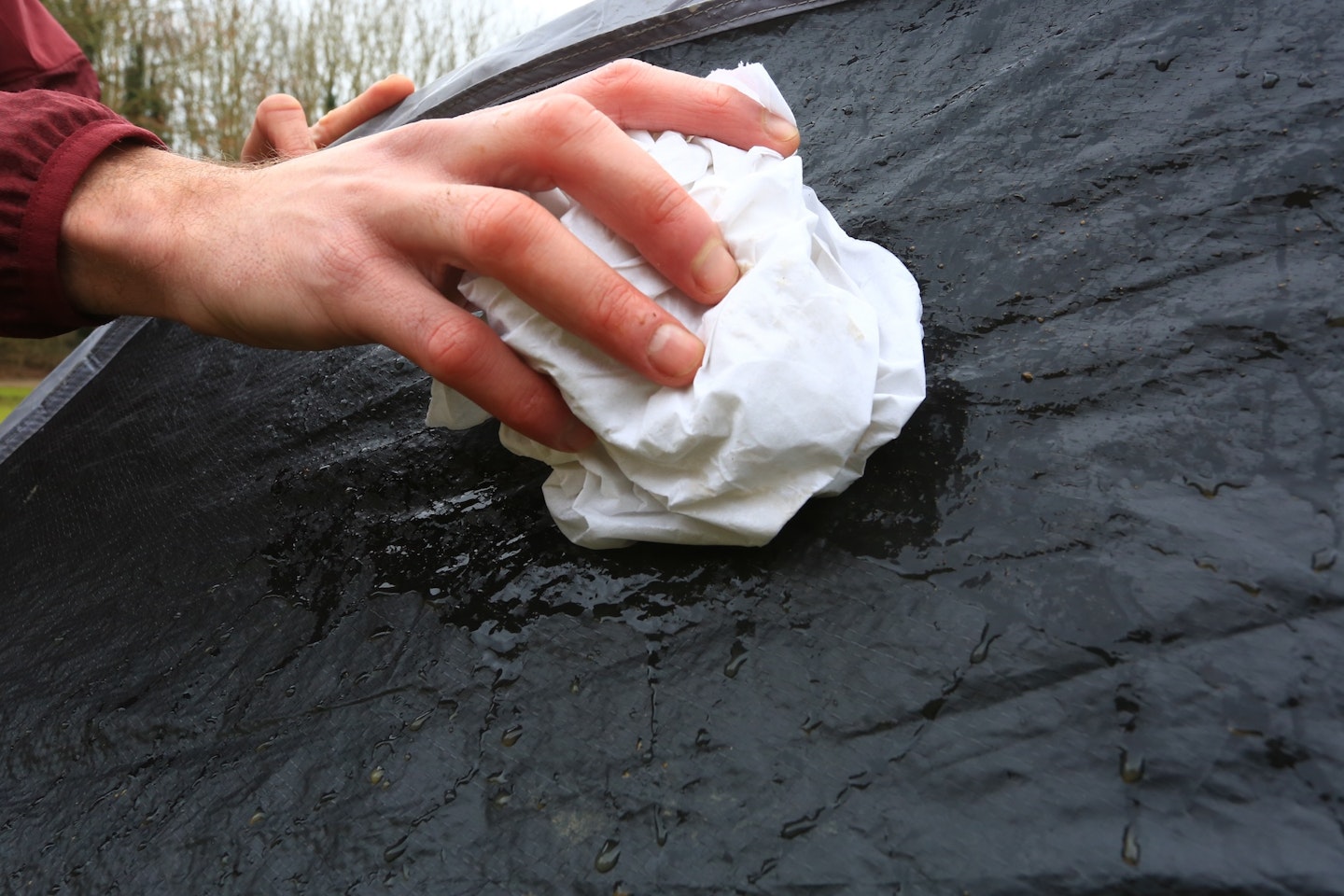 Wiping down a pop-up tent