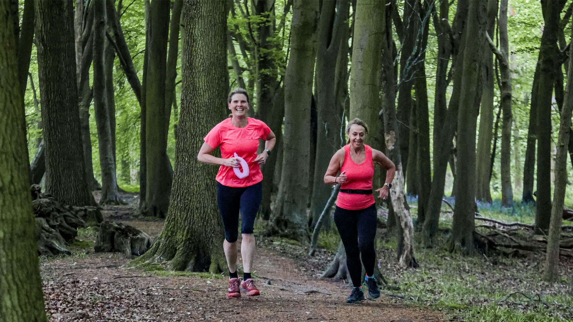 Runners taking it slow in the woods