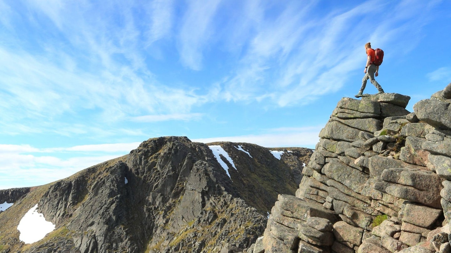 Man on rocky outcrop