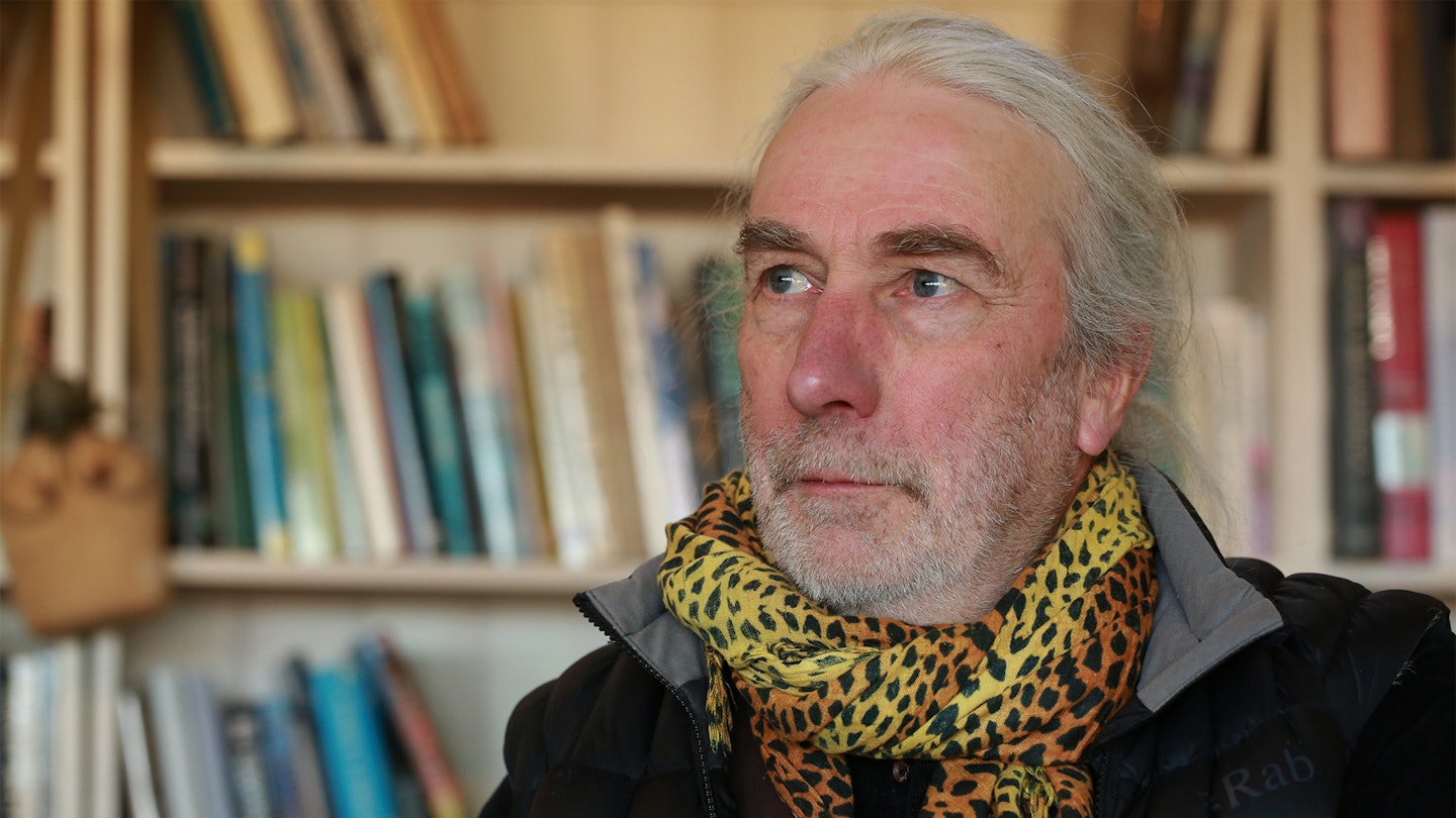 Simon Barnes in front of books