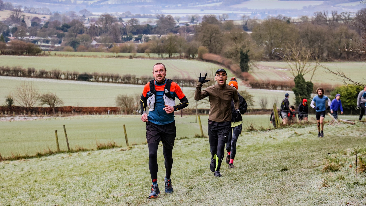 Amateur trail runners in a field
