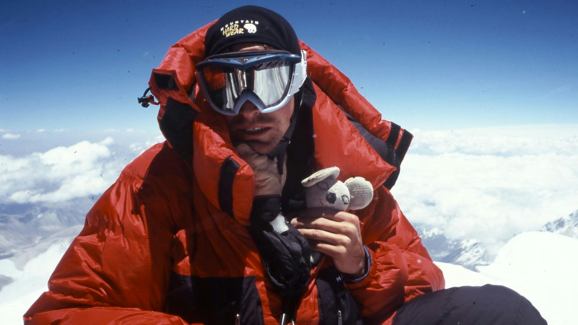Kenton Cool on Everest holding a mouse