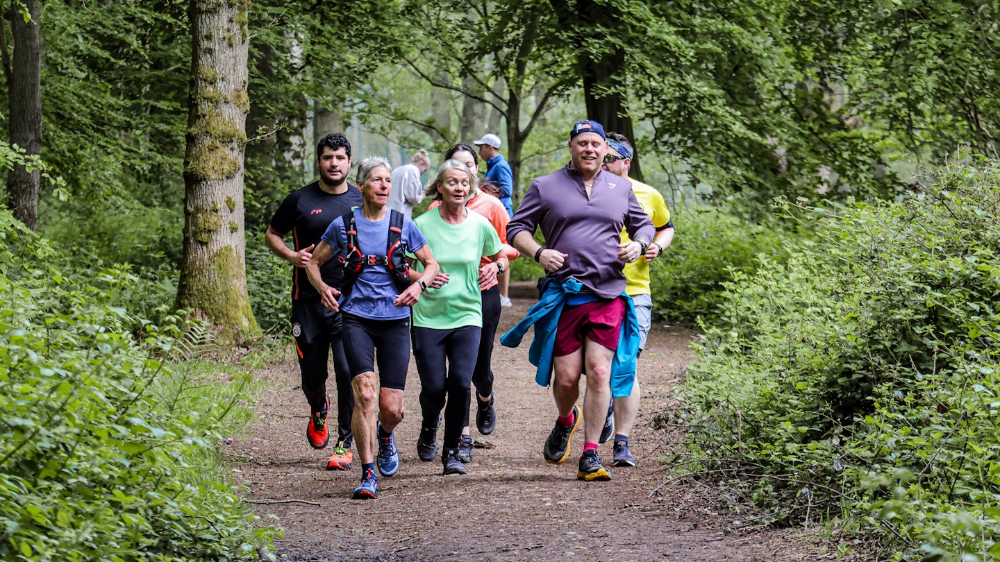 the team running in the woods