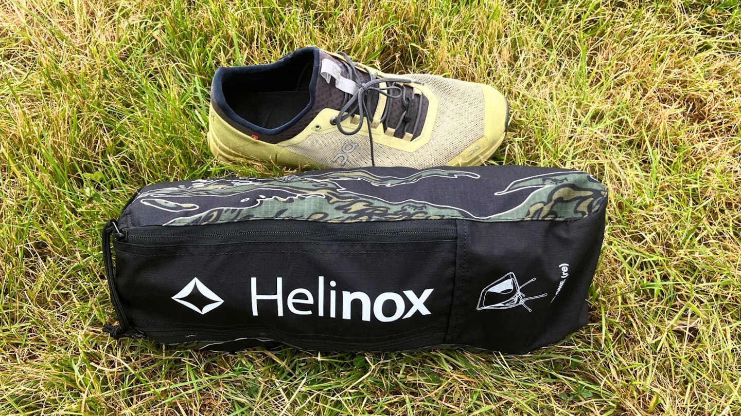 Comparing the size of the Helinox Chair One (re) with a shoe
