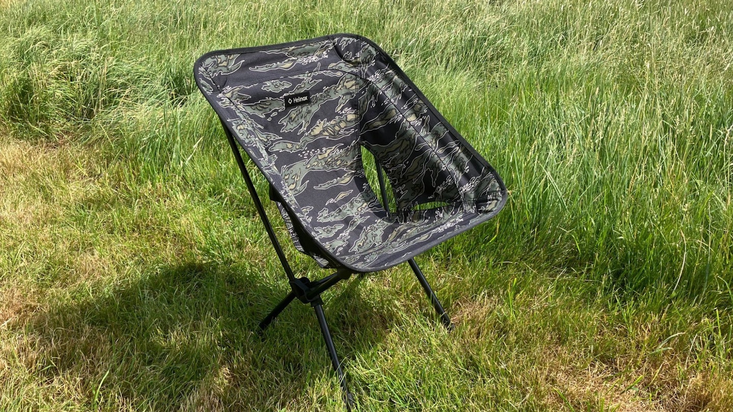 The Helinox Chair One (re) set up on the grass