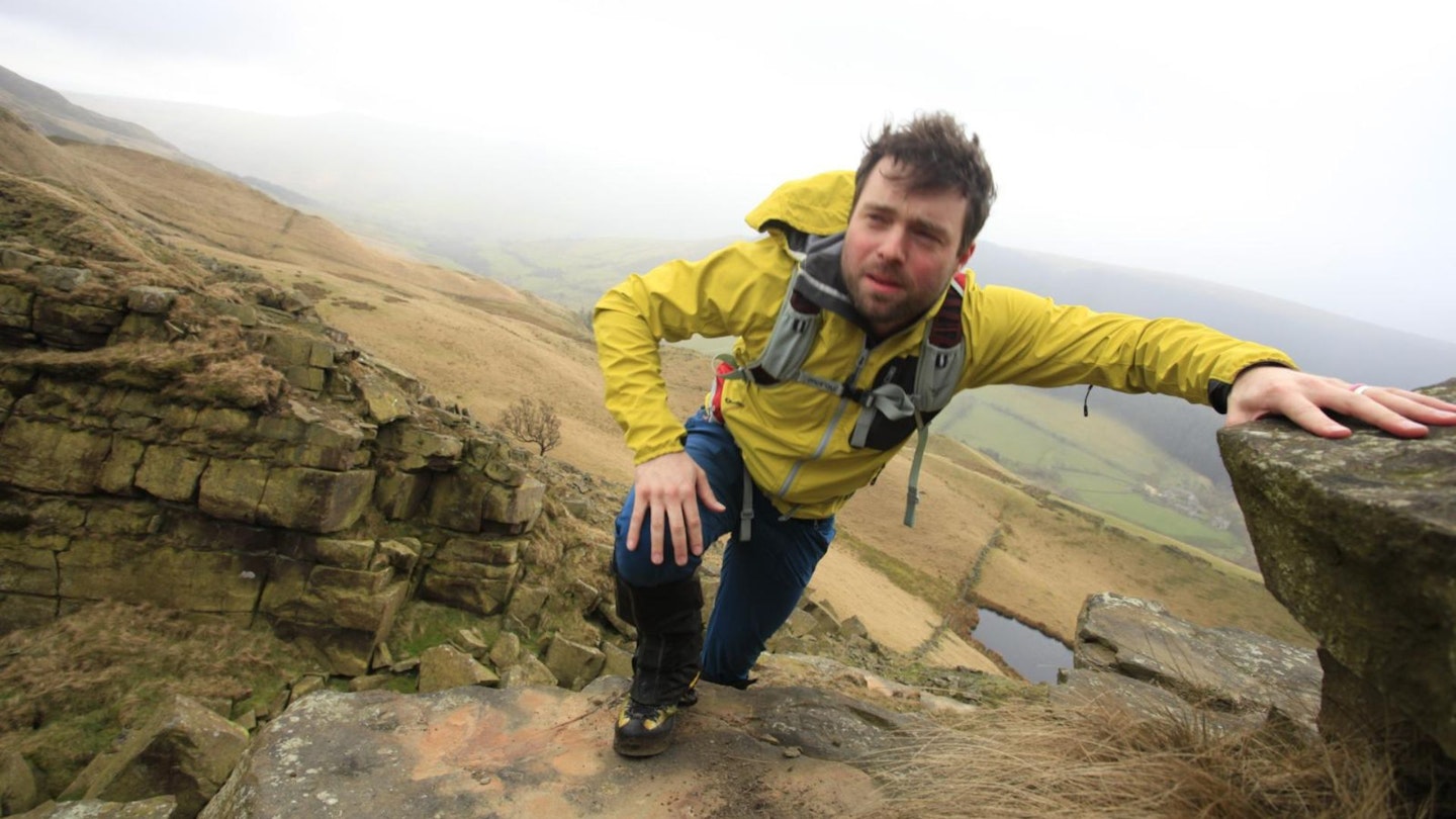 Hiker at Alport Castles, Peak District