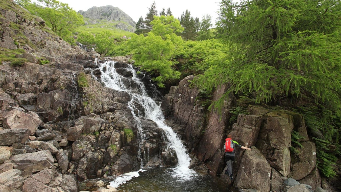 Hiker on Stickle Ghyll Scramble Langdale Lake District