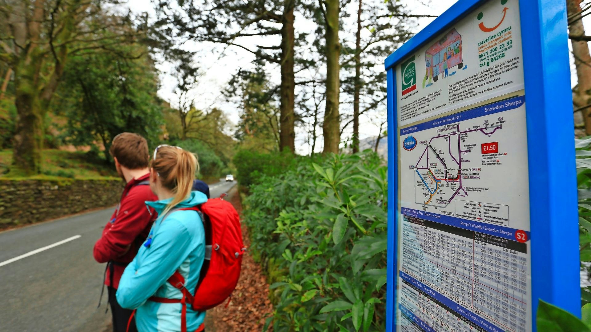 Hikers waiting for a bus in Snowdonia