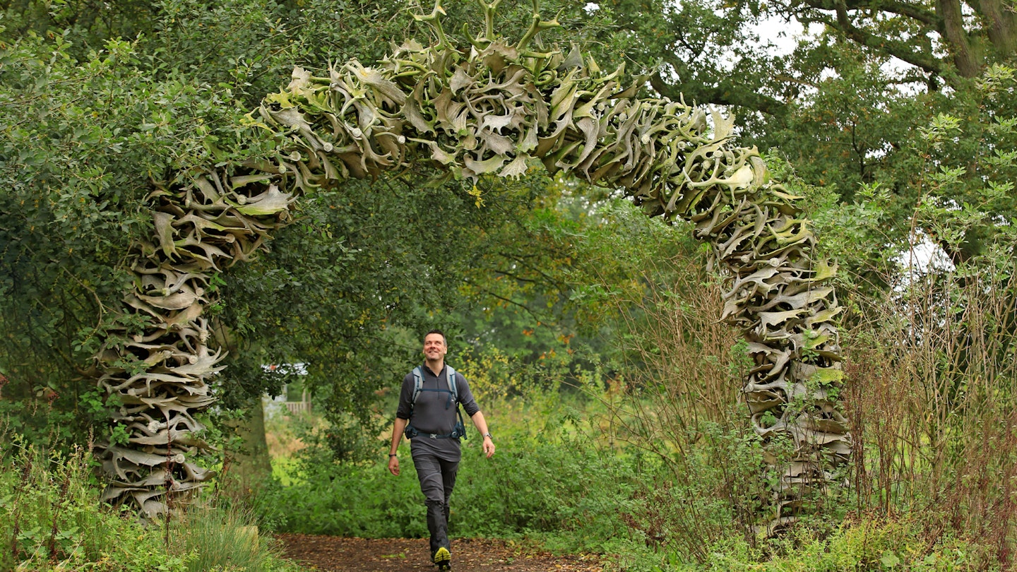 Nick walking under the Antler Arch