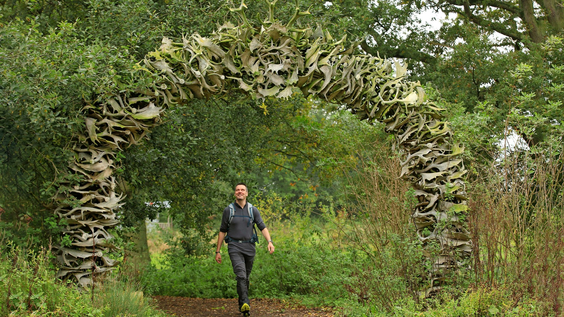 Nick walking under the Antler Arch