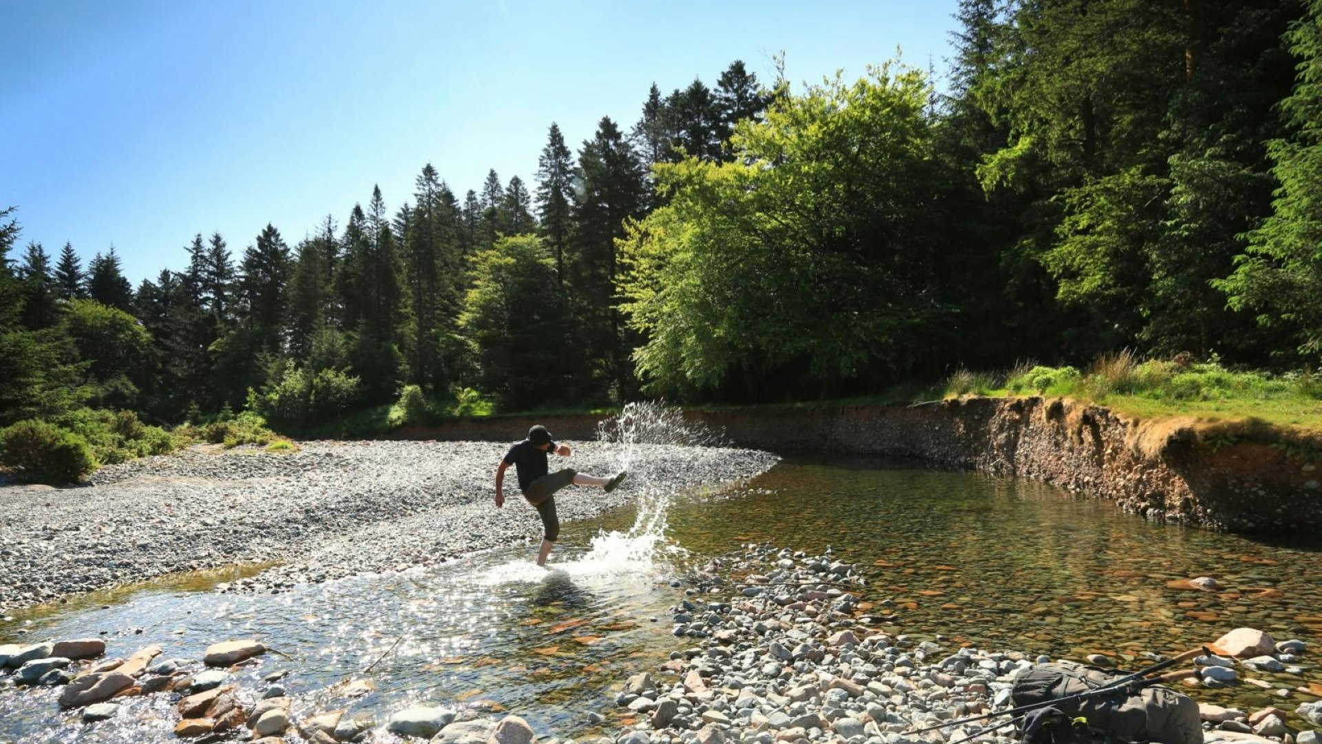 Hiker cooling off in the River Liza Ennerdale