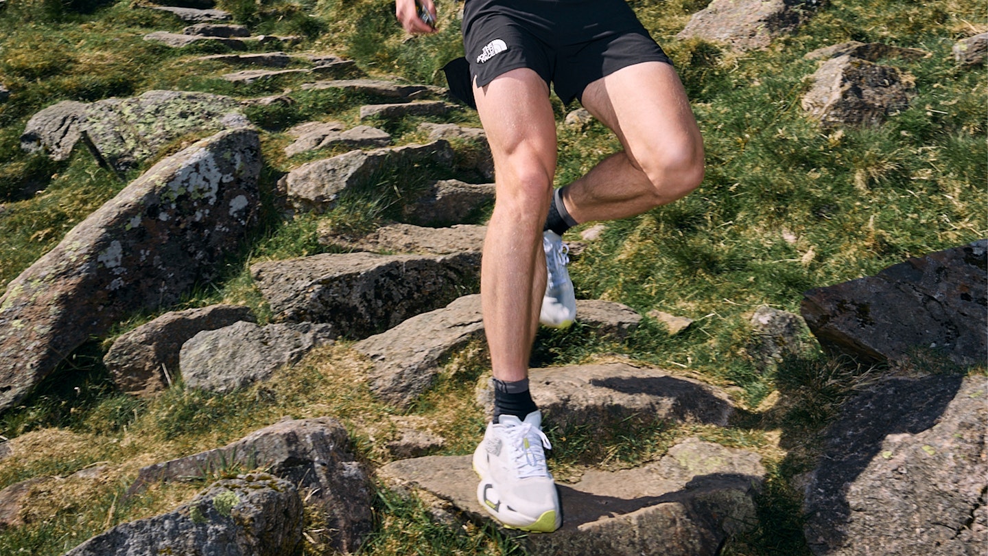 josh wade running in north face vectiv shoes