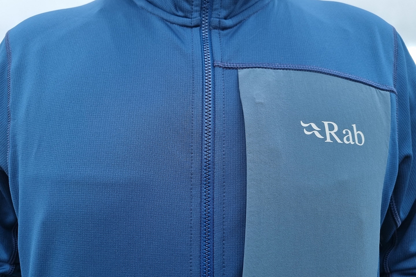 The Rab Superflux Hoody has a contrast chest pocket