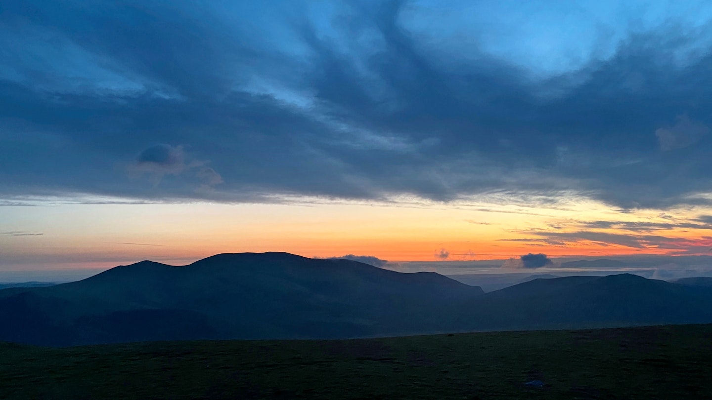 Watching the sun rise from camp on Blencathra