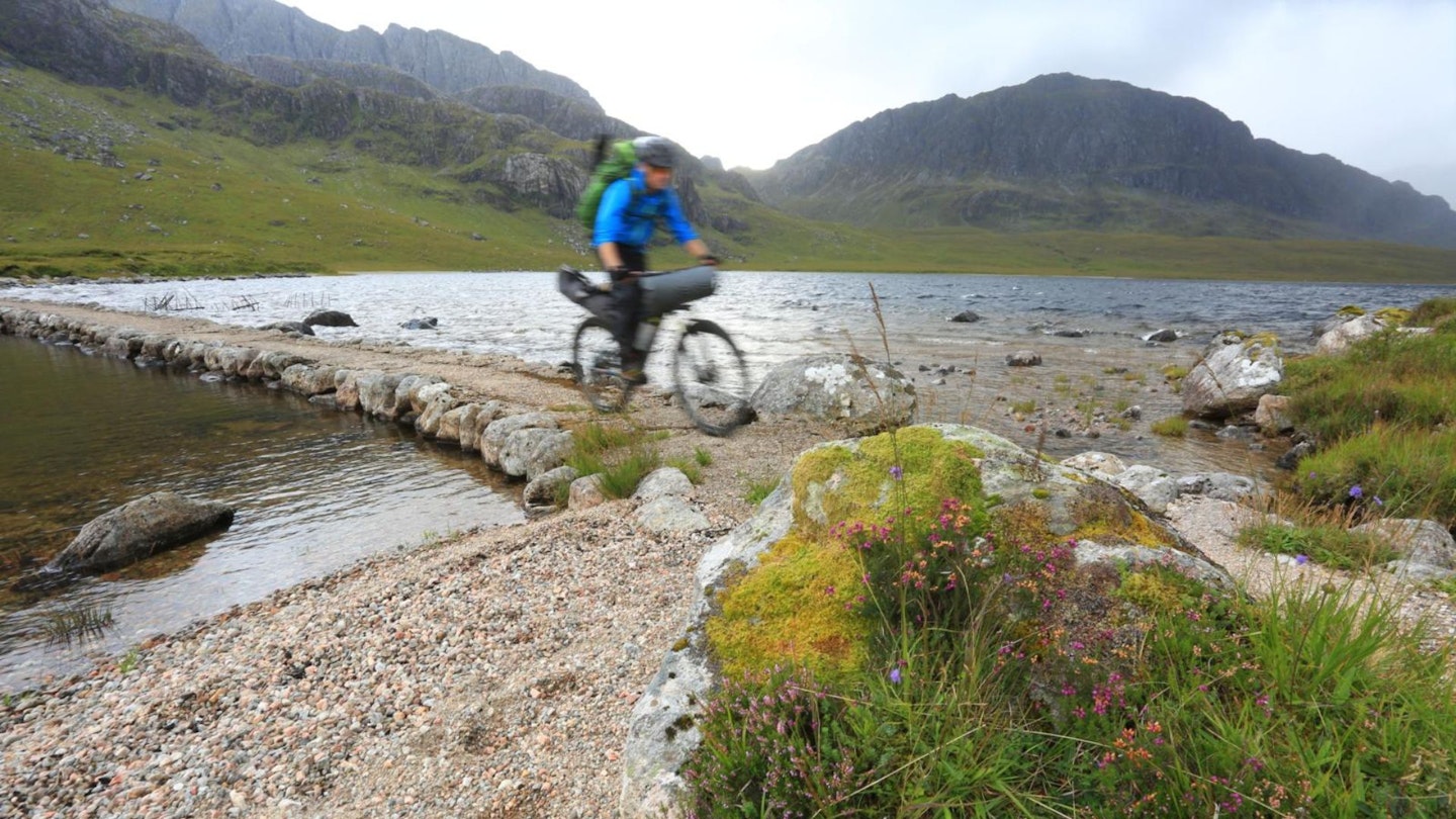 Causeway SE end of Fionn Loch towards A' Mhaighdean Fisherfield Forest Bikepacking Scotland